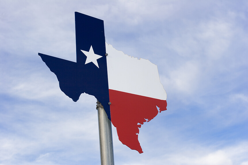 Texas%20state%20flag%20on%20a%20road%20sign
